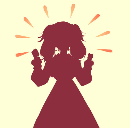 Silhouette of a woman with twin tails making fists with both handsの写真素材