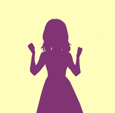 Woman posing in a fist pump shadow pictureの写真素材