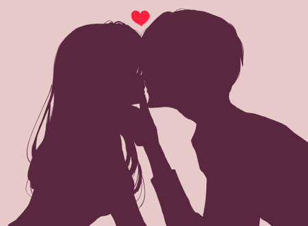 Kissing man and woman silhouetteの写真素材