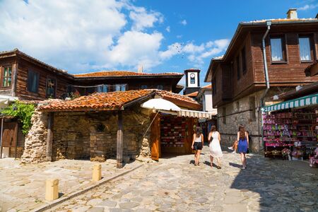 Nesebar, Bulgaria - May 30, 2015: Nessebar street view. Young girls walking on the streets of the old town.のeditorial素材