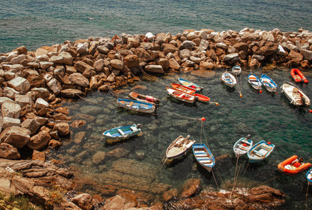 Fishing boats at a port with clean water.の写真素材