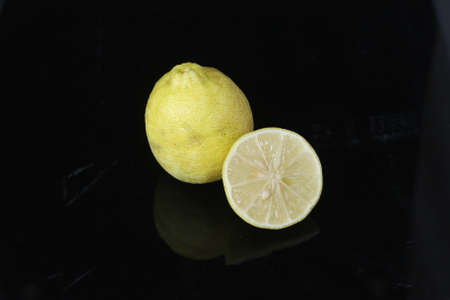 Lemon with black backgroundの写真素材