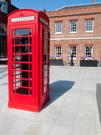 Portsmouth, England, March 2012, Red Telephone box in front of a public houseのeditorial素材