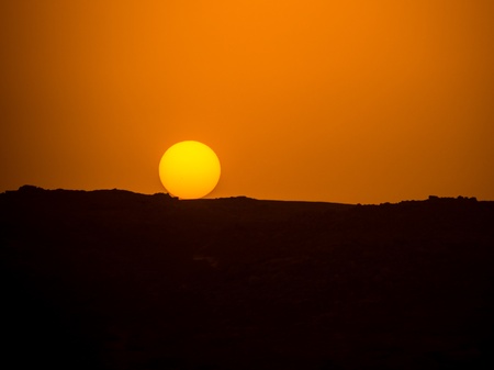 Sunset over mountainsの写真素材