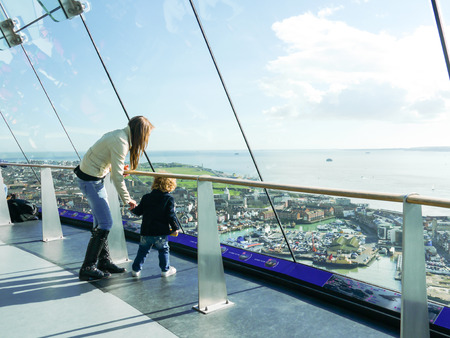 Mother and child at the top of the Spinnaker Tower in Portsmouth, Hampshire, Englandのeditorial素材