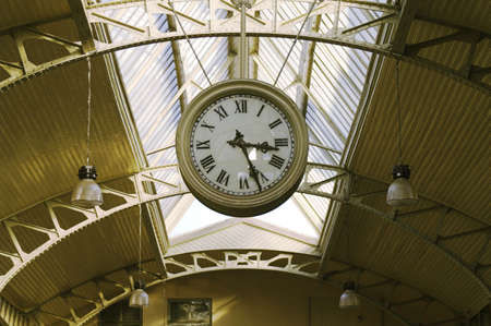 Hanging clocks - Big hanging clocks in a railroad station hall, Vitebsk Railroad Station, Saint Petersburg, Russia.の写真素材