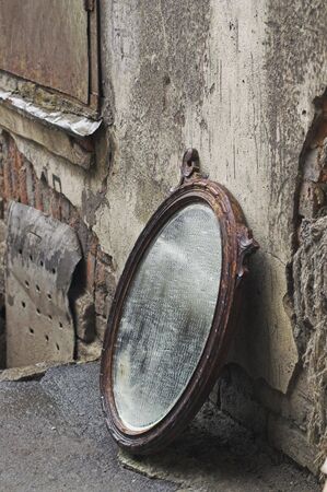 Old Mirror Standing Against Wallの写真素材