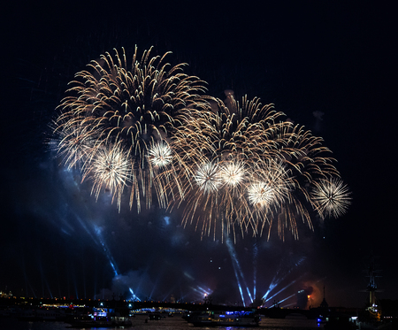 A white firework display in the night sky over Trinity bridge on the river Neva at Scarlet Sails festivity in Saint Petersburg ,Russiaの写真素材
