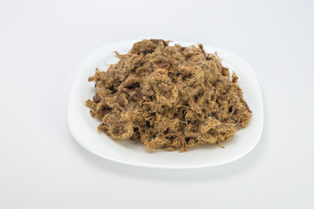 Duvan cvarci pork greaves on plate isolated on whiteの写真素材