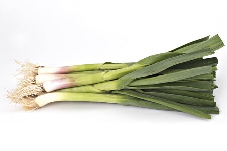 Young green garlic isolated on white backgroundの写真素材