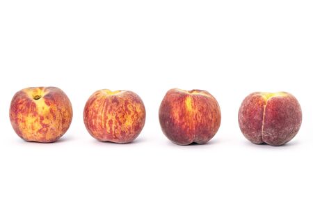 Fresh ripe organic peaches isolated on white backgroundの写真素材