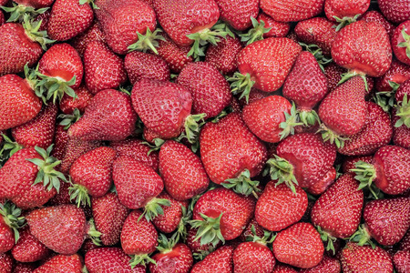 Pile of juicy ripe organic strawberries, textureの写真素材