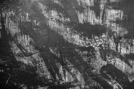 Black ink background painted by brush. Illustrationの写真素材