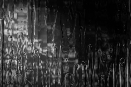 Black abstract background painted and blurredの写真素材