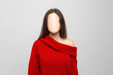 Woman Without a Face. On the walls hang the face masks. Nobody.の写真素材