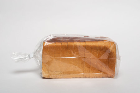 sliced bread isolated on white background. White square fresh yukon bread on a white background