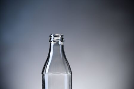 Empty glass bottle for reusable drinks.の写真素材