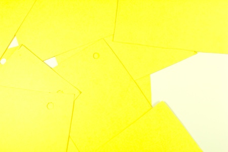yellow paper on white backgroundの写真素材
