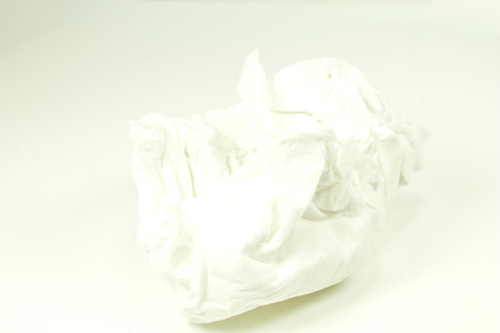 Crumpled paper on white の写真素材