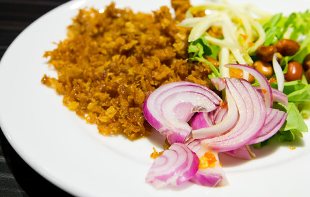 Crispy catfish spicy salad , thai foodの写真素材
