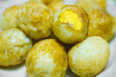 boiled egg fried in plateの写真素材