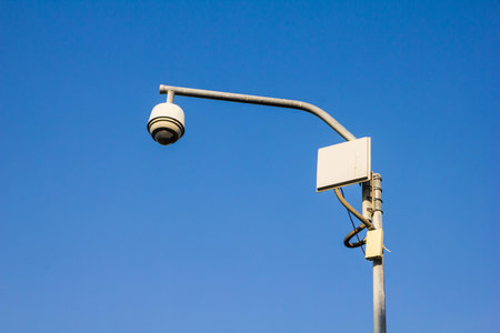 security dome shaped cctv cameras with blue sky backgroundの写真素材