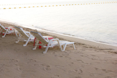 old plastic chair on the beach