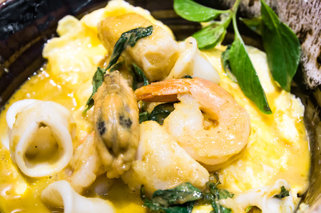 Curry seafood with rice in bowlの写真素材