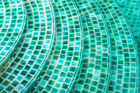 Small green tiles texture in swimming poolsの写真素材