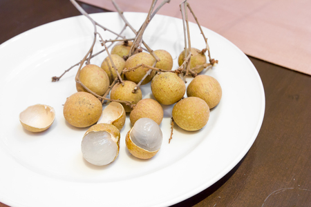 Asian fruit,longan on white plateの写真素材