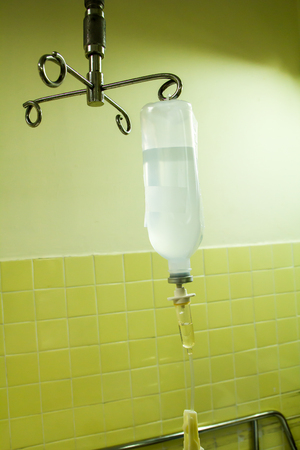 iv bag hanging on a metal poleの写真素材