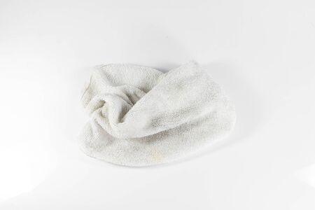old towel on white backgroundの写真素材