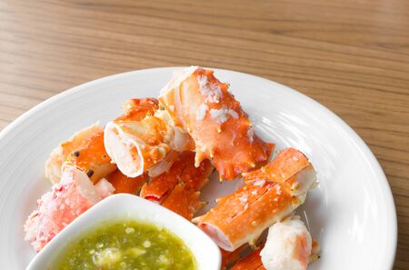 king crab legs on white plateの写真素材