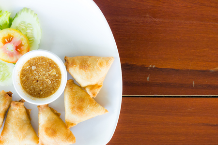 Fried spring roll with sauceの写真素材