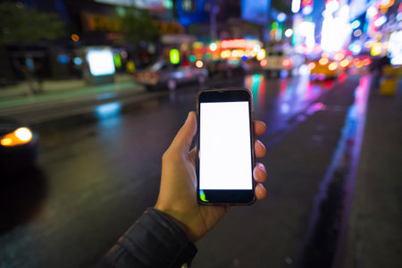 man holding a mobile phone in Manhattan New York City