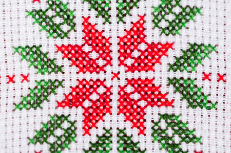 Handmade cross-stitch Christmas decorationの写真素材
