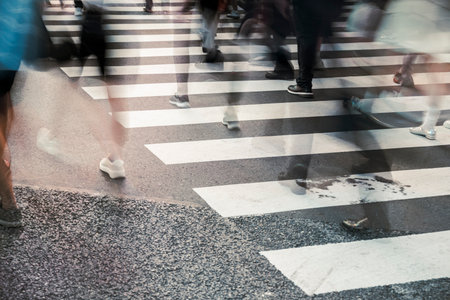 Abstract Blur of Pedestrians on City Crosswalkの写真素材