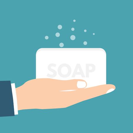 Hand holding soap. Wash hands. Vector illustration.のイラスト素材
