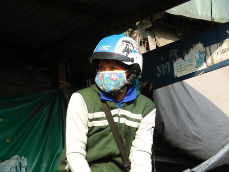 the ticket inspector on Khlong Saen Saep, Bangkok, Thailandの写真素材