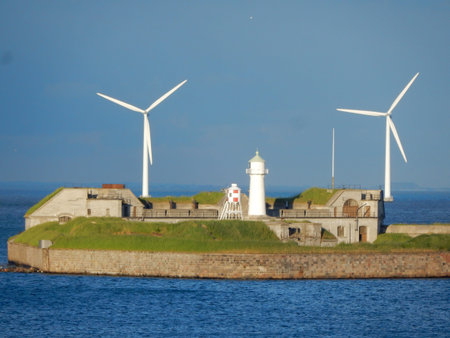island at the port with wind turbines in the background, Copenhagen, Nordhavn, Denmarkの写真素材