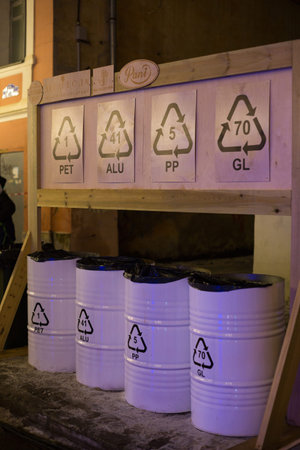 Kaluga, Russia December 18, 2020. Metal barrels containers for separate collection and sorting of...