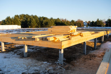 The foundation of a wooden frame house on stilts is a construction site, the process of building a...