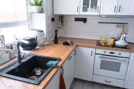 General cleaning in the kitchen, surface cleaning and grease removal products, a messの写真素材