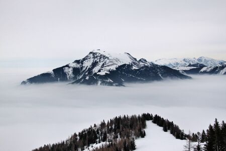 A view of the Austrian Mountains covered with snow near Saltzburgの写真素材
