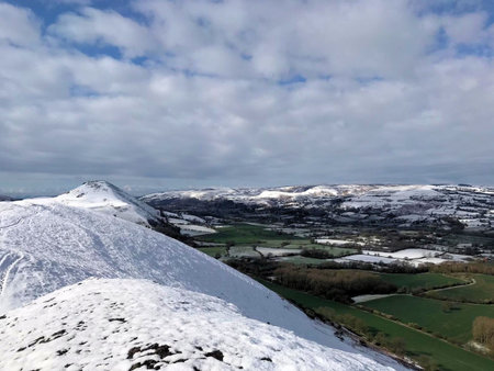 A view of the Caradoc Hills in Shropshire covered with Snow