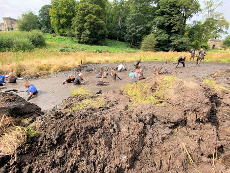 Cholmondeley in Cheshire in the UK in September 2021. People taking part in a Tough Mudder event in...