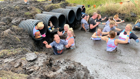Cholmondeley in Cheshire in the UK in September 2021. People taking part in a Tough Mudder event in...