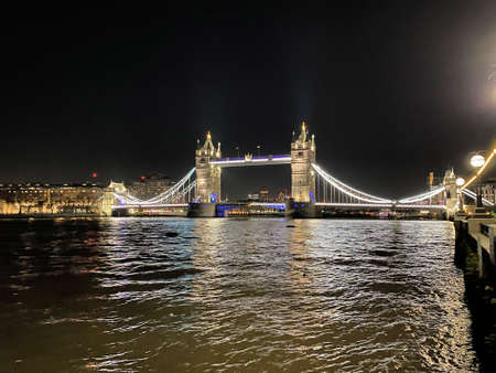 A view of Tower Bridge in London at nightの写真素材