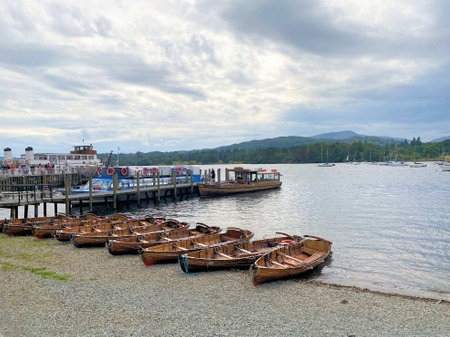 Boats moored to the pier in Ambleside in the Lake District, UKのeditorial素材