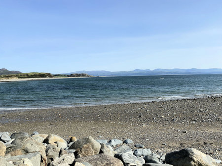 A view of the North Wales Coastline at Criccieth on a sunny dayの写真素材